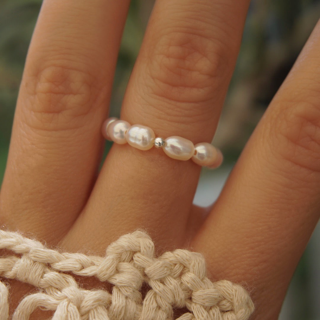 Rings with pearls on sale in them